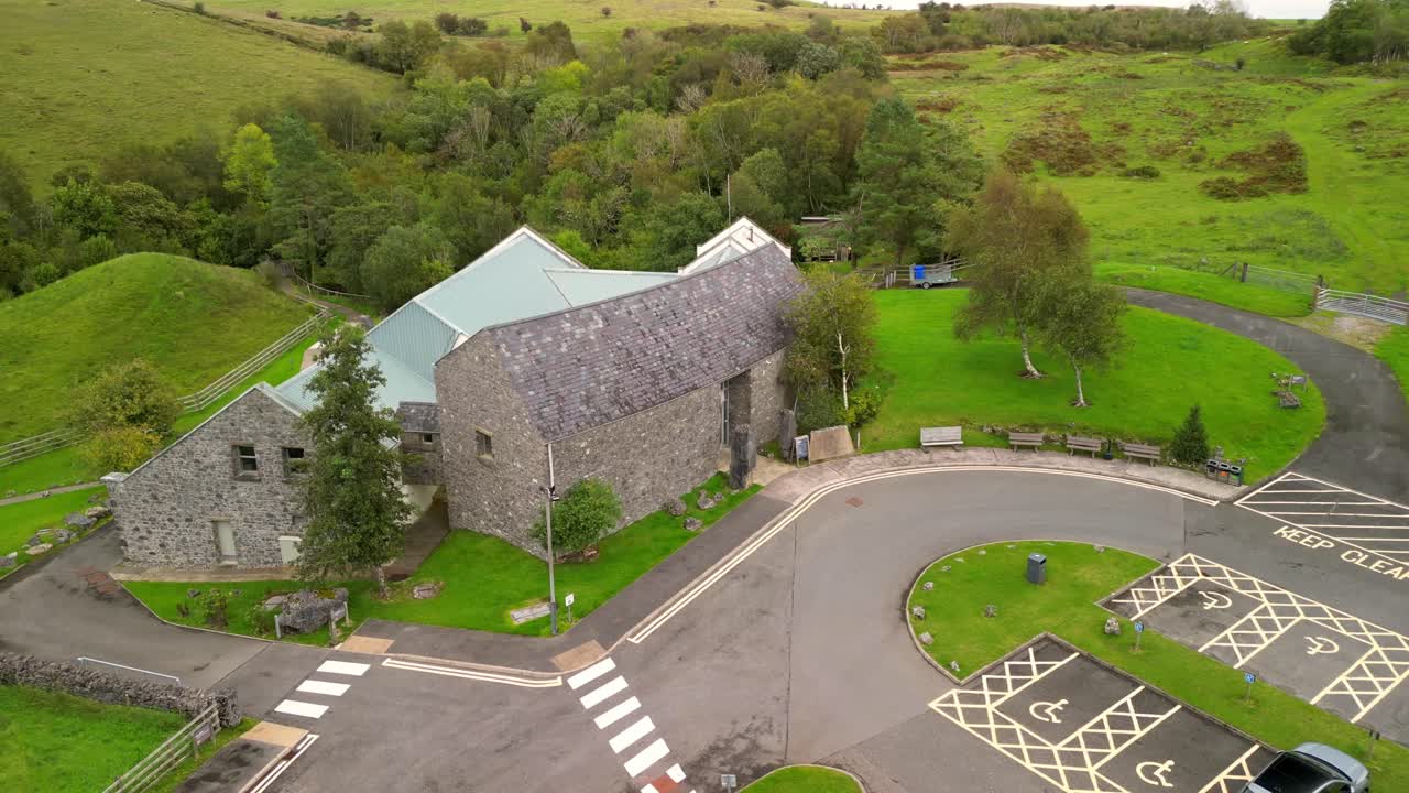 Clockwise 4K 30FPS aerial of Marble Arch Caves in County Fermanagh, Northern Ireland on a bright sunny day. Produced with Rec709 color