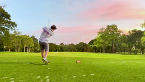 golfer executing a swing in bangkok, thailand