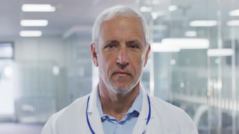 portrait of male doctor smiling in hospital