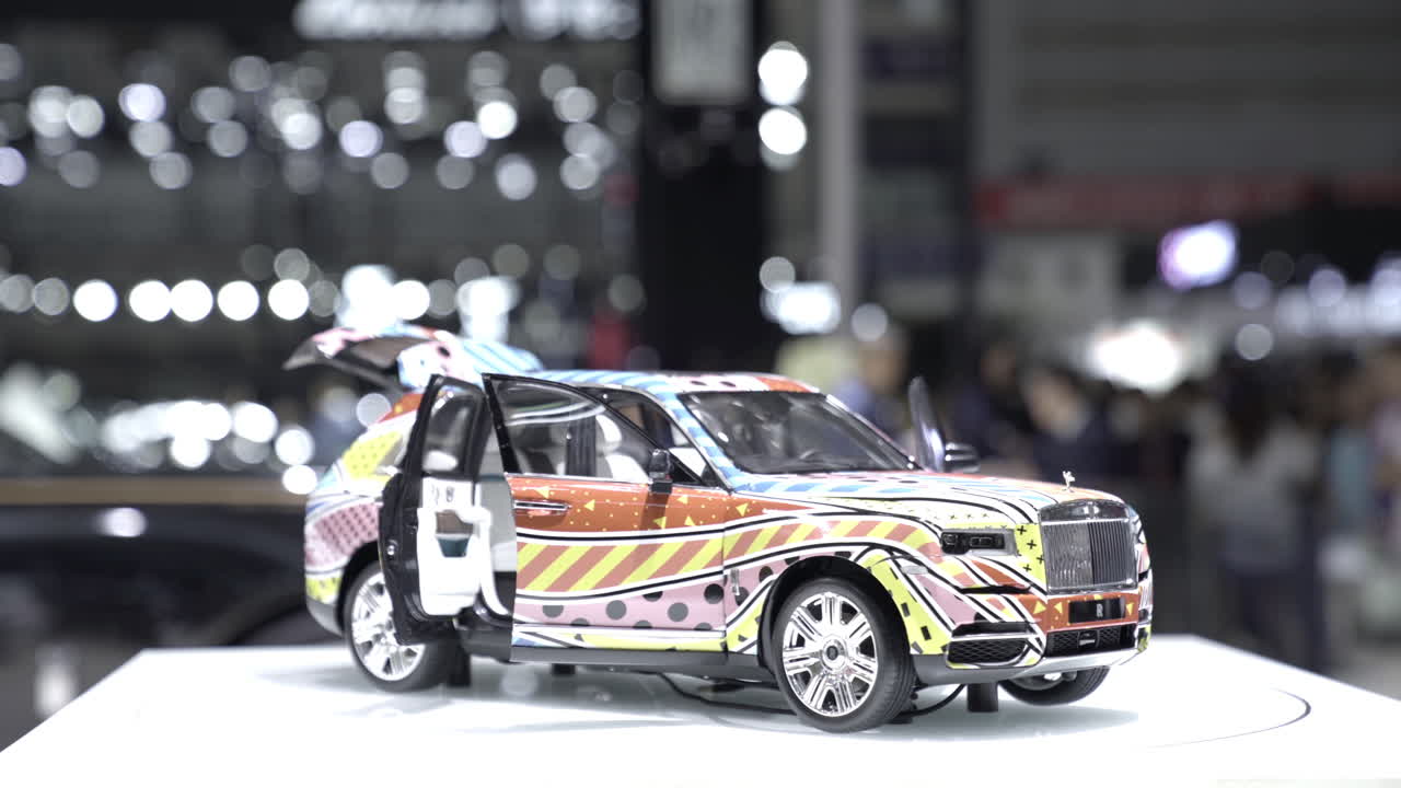 Decorated Rolls-Royce miniature rotates on a stand at 2019 International Auto Show in Shenzhen, China. June 1, 2019.