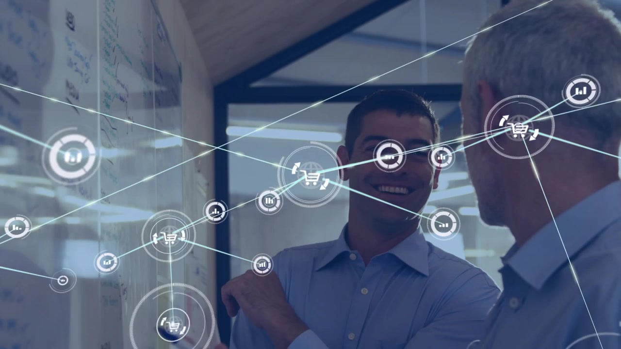 Mature man marking glass board, initiating icon overlay tracking gestures, men planning business
