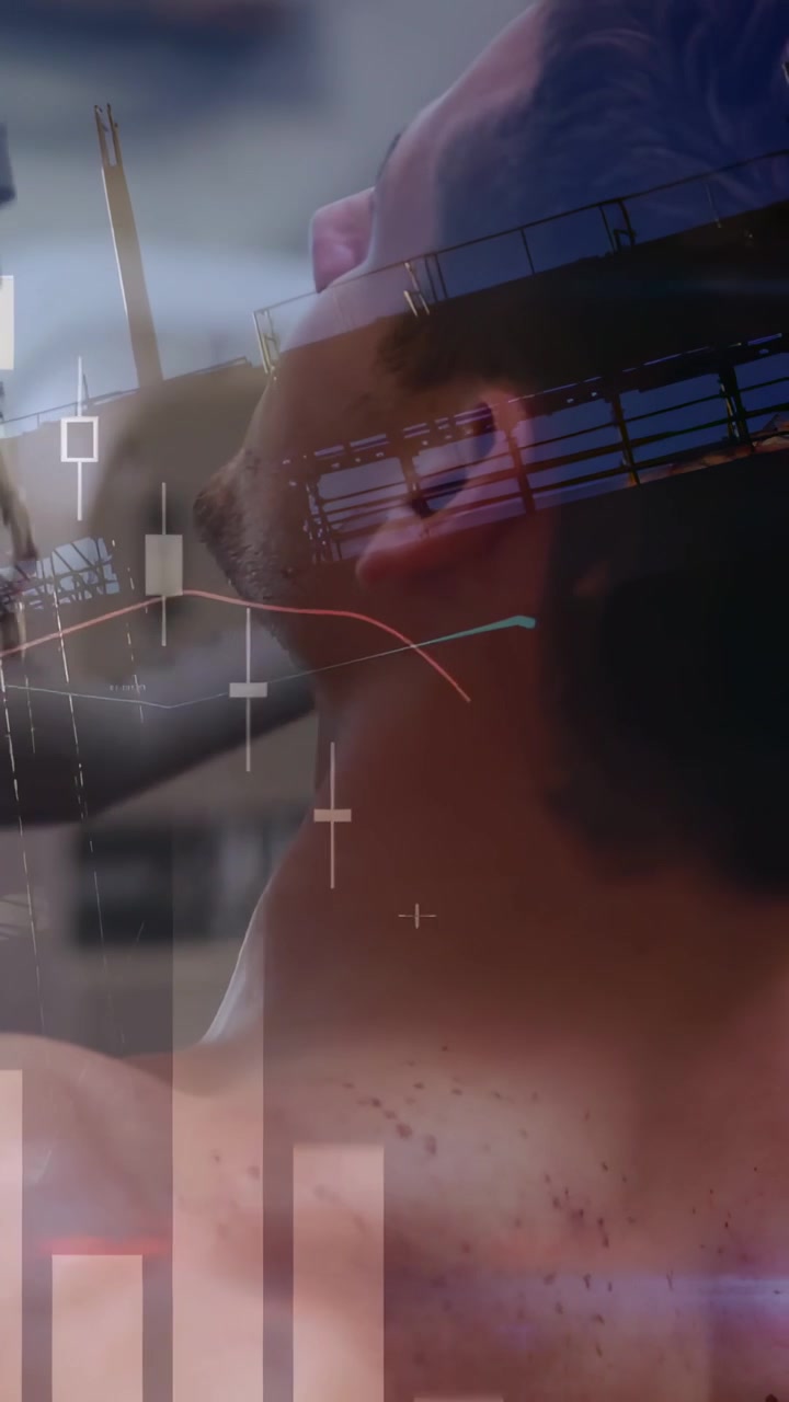 Video verticale: Grafici in movimento che spingono un uomo a torso nudo a inclinare la testa all'indietro sul set, rivelando la mascella e il ponte del naso.