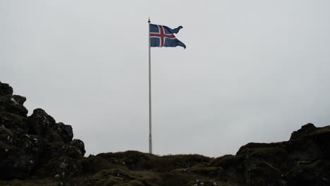 slow motion iceland flag blowing in a cold wind