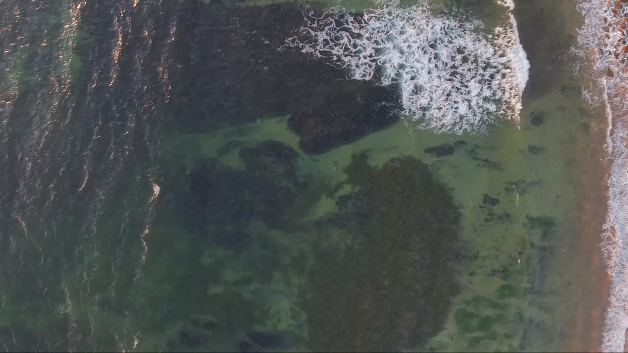Top Down View 2 of Pristine water, reef, shoreline and horizon