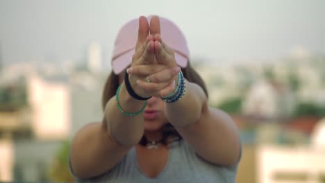 Slow-Motion-of-Teenage-Girl-Pretending-to-Shoot-with-Rack-Focus