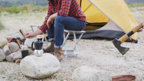 caucasian couple camping in nature