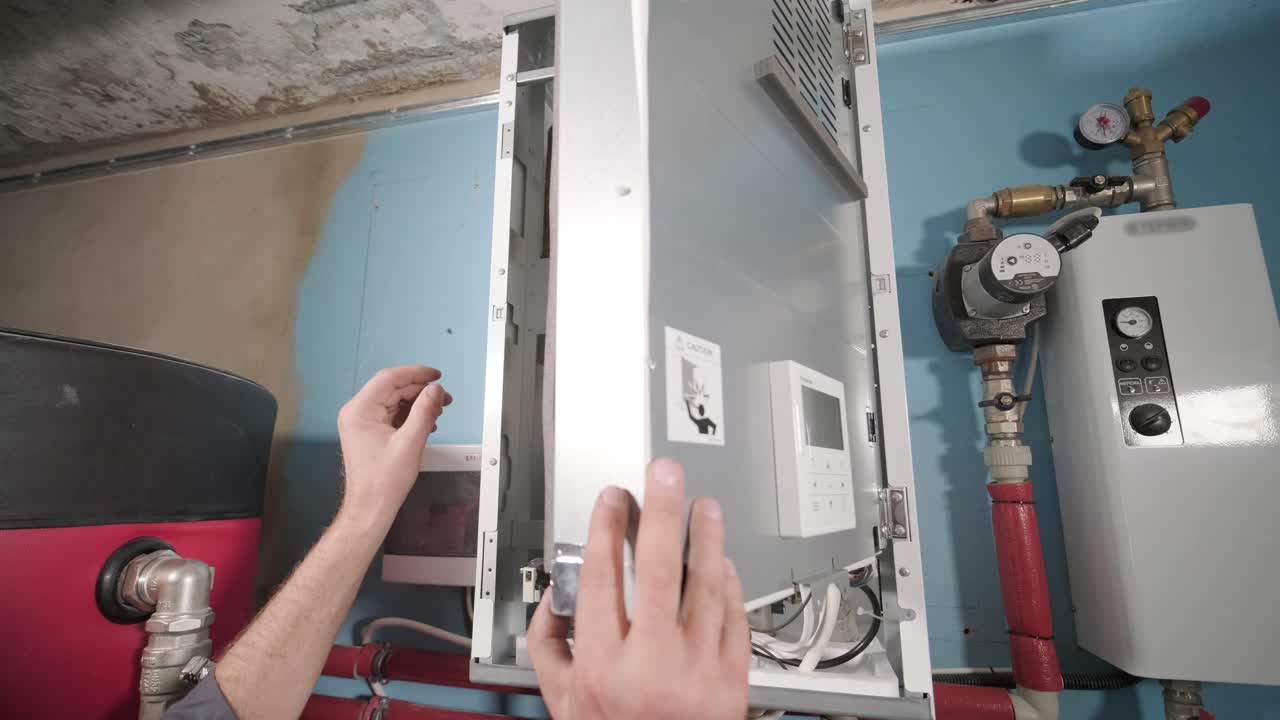 HVAC technician installs heating, ventilation and air conditioning systems
