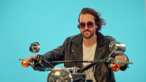 Motorbike,-studio-and-man-with-a-sunglasses