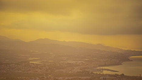 misty timelapse of changing sky over malaga