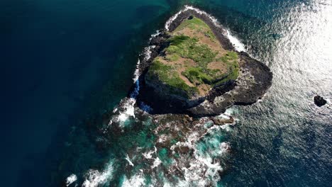 cook island and seascape in nsw, australia - aerial drone shot