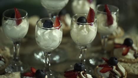 delicious dessert cups with strawberries and blueberries