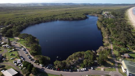 lake ainsworth in lennox head, nsw, australia - aerial shot