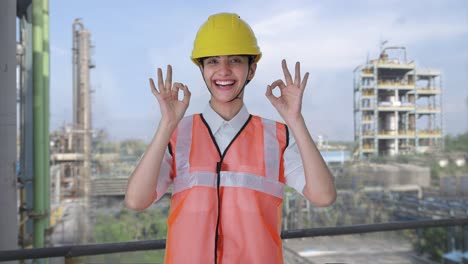 happy indian female architect showing okay sign