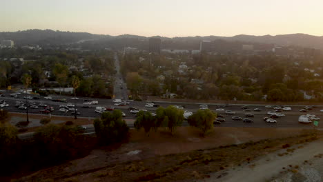 Aerial-of-busy-traffic-filled-highways-of-the-101-and-405-in-the-San-Fernando-Valley-of-Los-Angeles