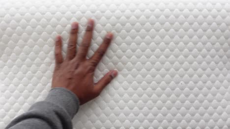 close up of a white memory foam mattress topper