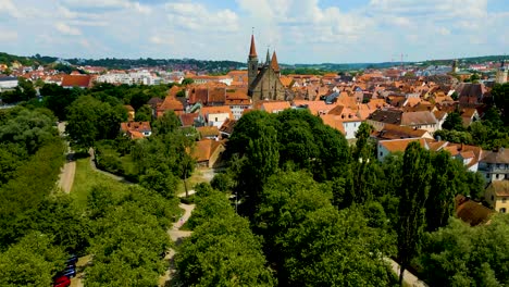 4k aerial drone video of the st. johannis kirche church and kirche st. gumbertus church in ansbach, germany