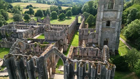 drone aerial footage historical 13th century fountains abby - north yorkshire - england