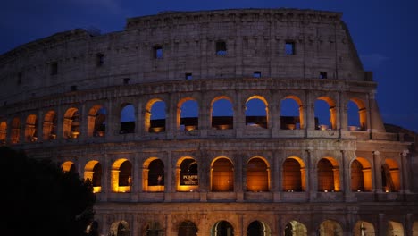 colosseum amphitheater in rome at night (italy)
