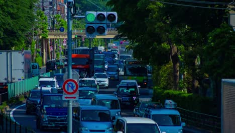 a timelapse of the traffic jam at the urban street in tokyo long shot