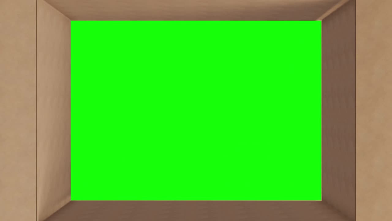 por encima de la pantalla verde en una caja de cartón marrón con apertura de la tapa sobre fondo negro