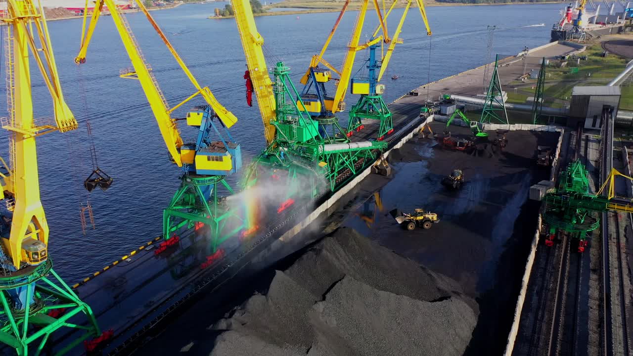 Industrial safety, coal yard is sprayed with water to control dust emissions