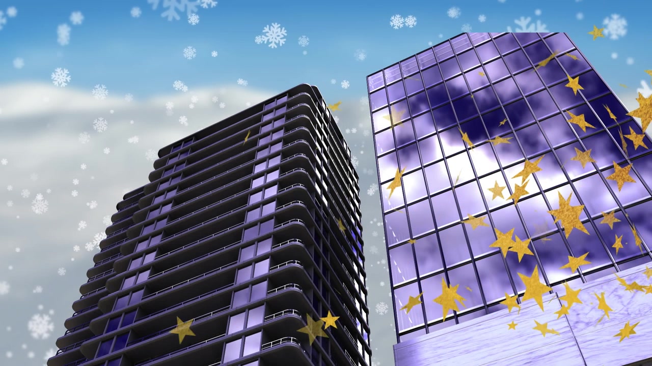 Grattacieli moderni con neve che cade e sovrapposizione di stelle dorate.