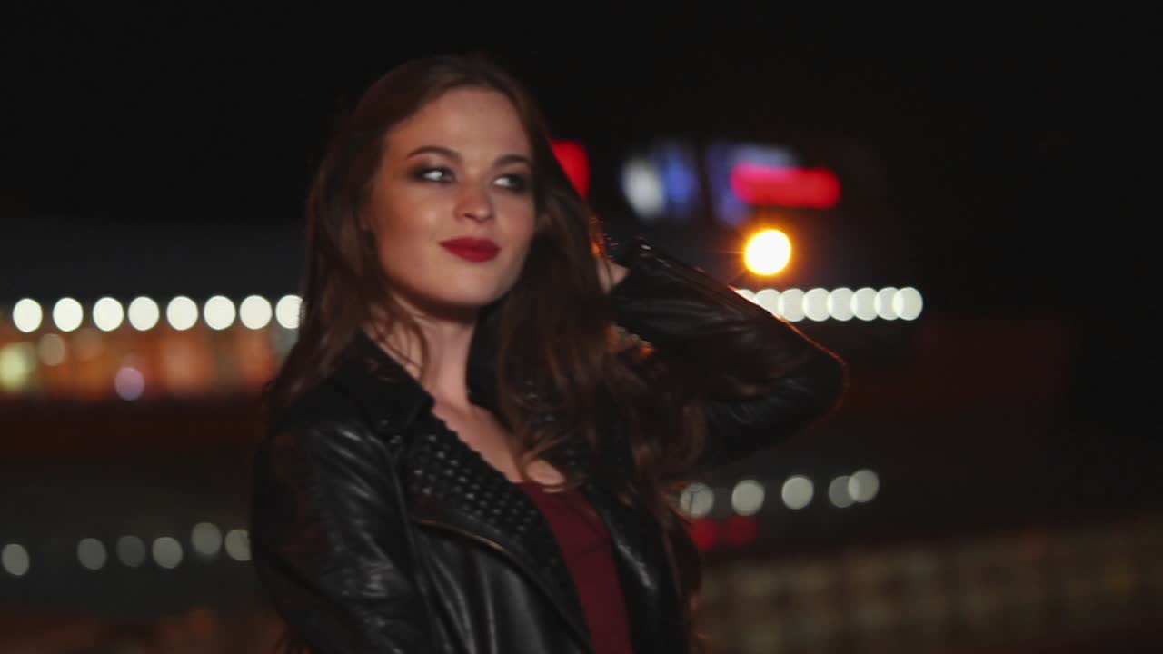 Beautiful Woman at Night in City