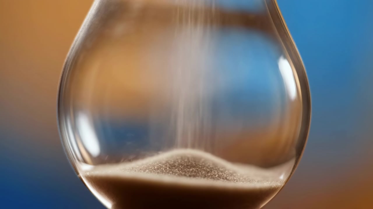 Hourglass flowing sand, in neutral background with gradient colors, with hourglass, from a close-up perspective perspective, with brown, blue accents, and time passing patience mood.