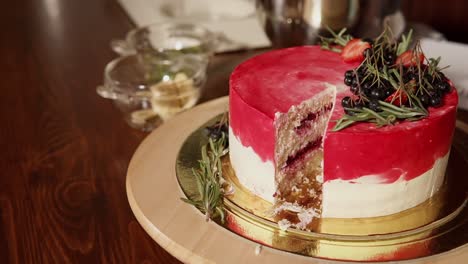 beautifully decorated red velvet cake with berries