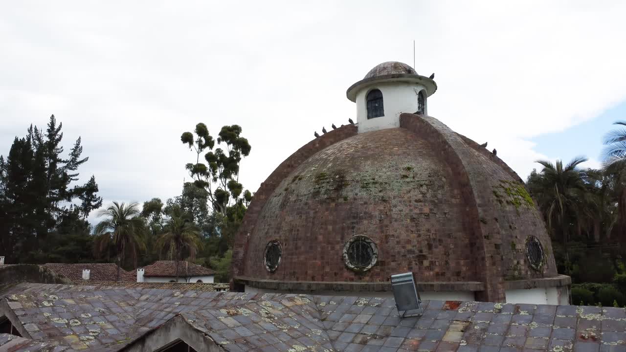 Panoramic view of the dome of the Barrio G&uuml;itig church in the midst of nature