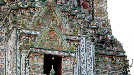 close-up views of wat arun's ornate architecture