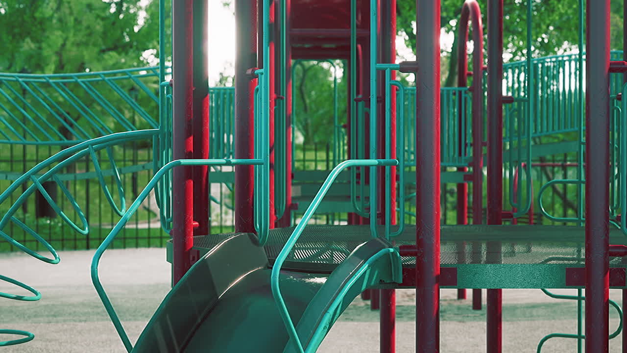 Empty swings on summer kids playground