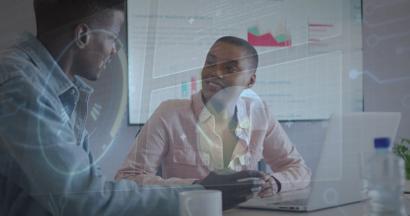 Colleagues opening laptop initiating business data overlays swiping tablet analyzing chart figures