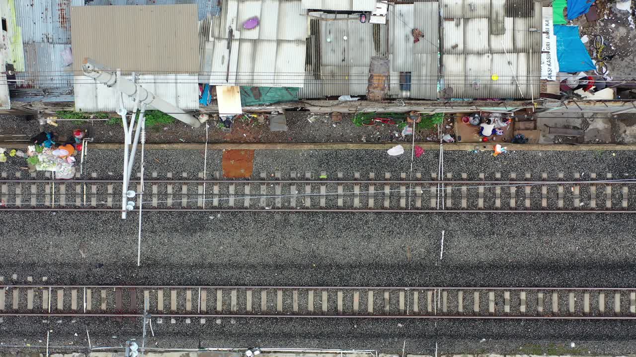 Train Tracks and Slum Housing Aerial View