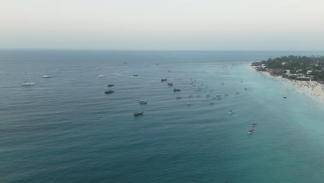 Barcos-En-Alta-Mar-En-La-Playa-De-Nungwi-En-La-Isla-De-Zanzíbar,-Tanzania