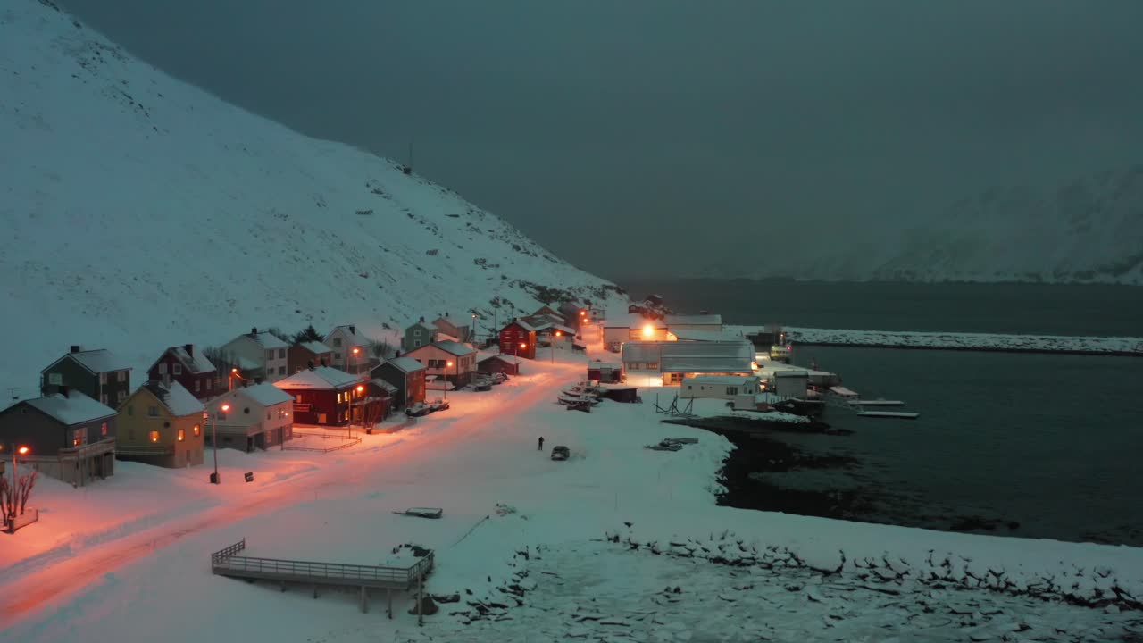 Moments before the snow storm hits the small village of Skarsvåg in Northern Norway. Aerial shot