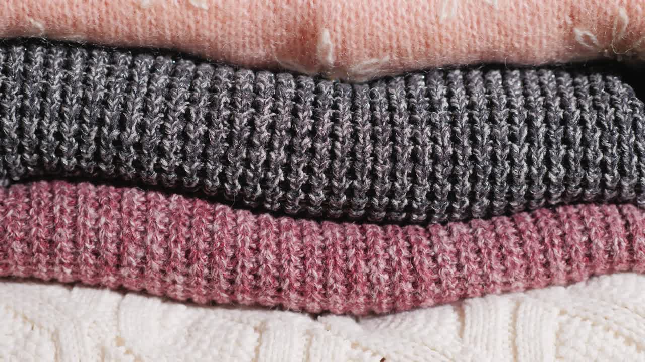 Tilt shot: Neatly folded winter clothes