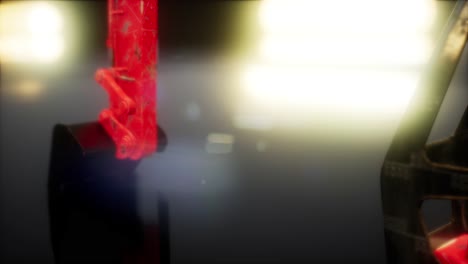 excavator in the dark with bright lights