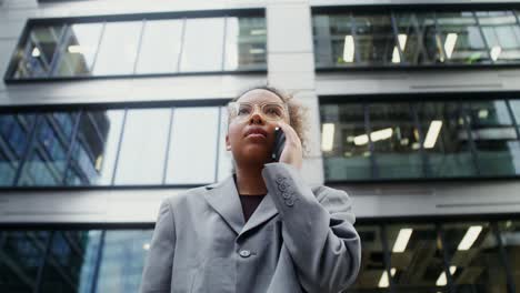 businesswoman on a phone call in a city