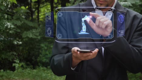 businessman uses hologram with robo hand
