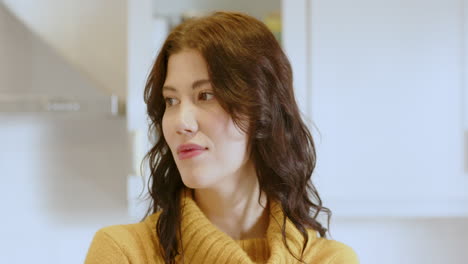 woman in cozy sweater smiling at home, enjoying peaceful moment, copy space