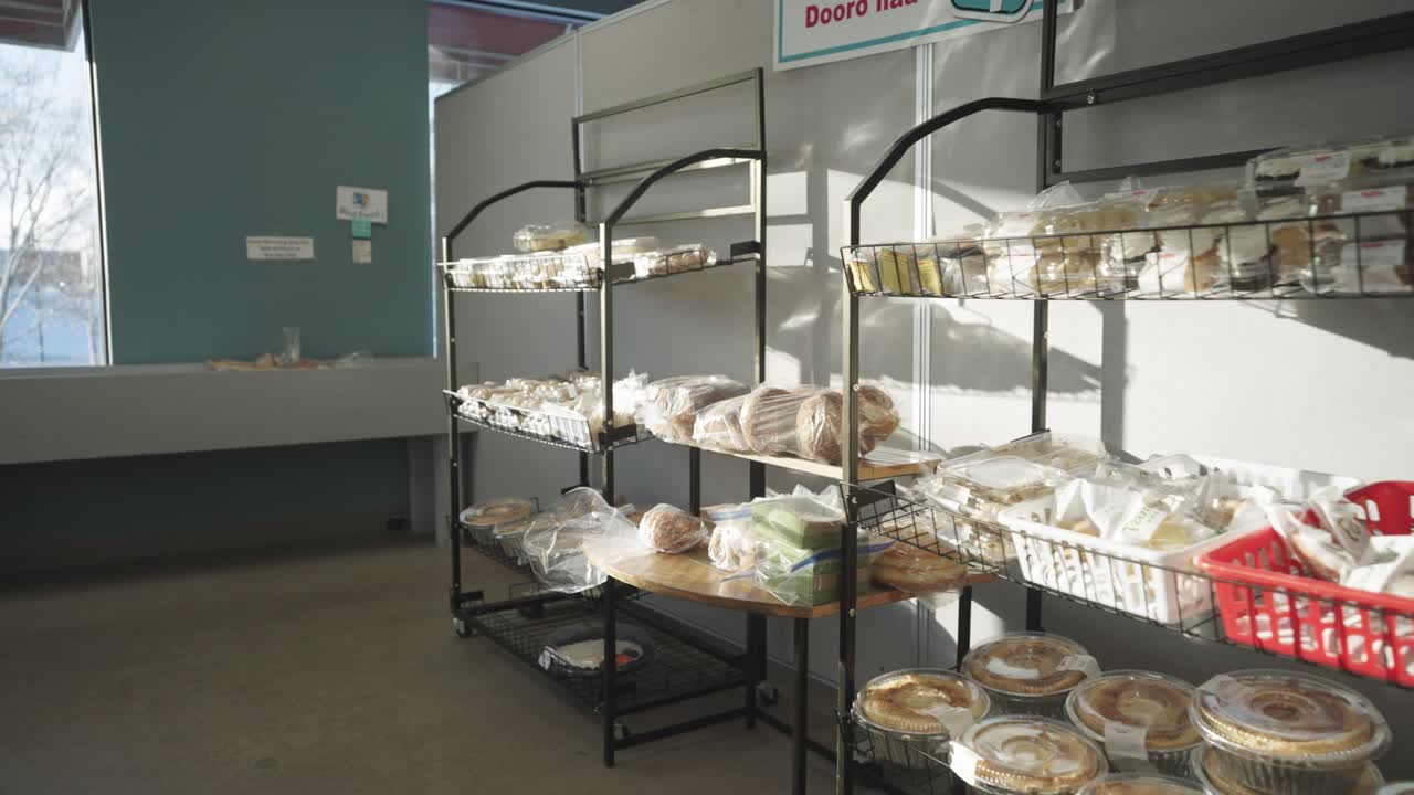 Filled dessert items at food shelfs at a grocery store in Minnesota, USA on a sunny day.