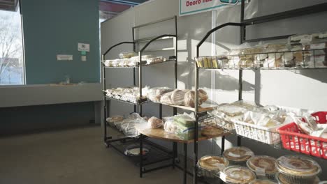 filled dessert items at food shelfs at a grocery store in minnesota, usa on a sunny day.