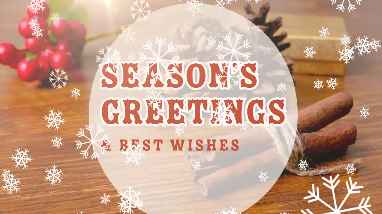animación de los saludos de la temporada texto sobre la nieve cayendo y decoraciones de navidad en la mesa