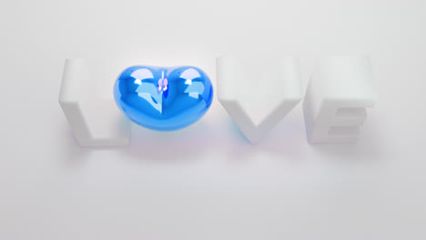 white love letters sign with the blue heart instead of "o" letter