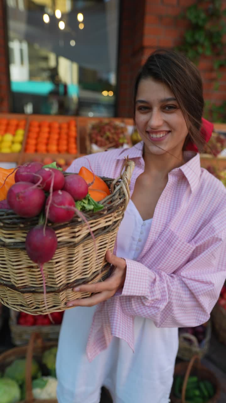 Woman shopping for fruits and vegetables at a grocery store