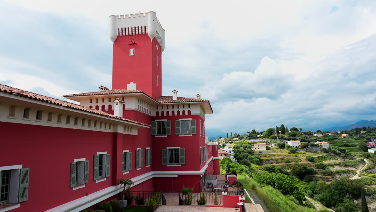 Aerial view of the Chateau de Cremat winery and the city behind it