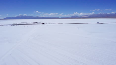 rows of extracted salt at salinas grandes in argentina, forward aerial