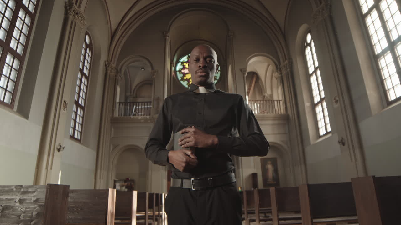 Portrait of African-American Priest in Church