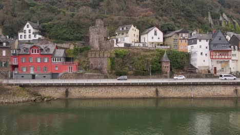 gliding drone flight from cochem on the banks of the river moselle and the facades of the beautiful houses in this incredibly beautiful german city